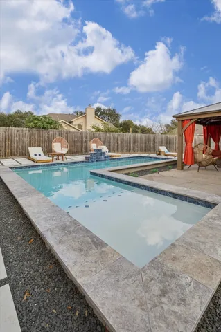 a view of a lake with a building in the background