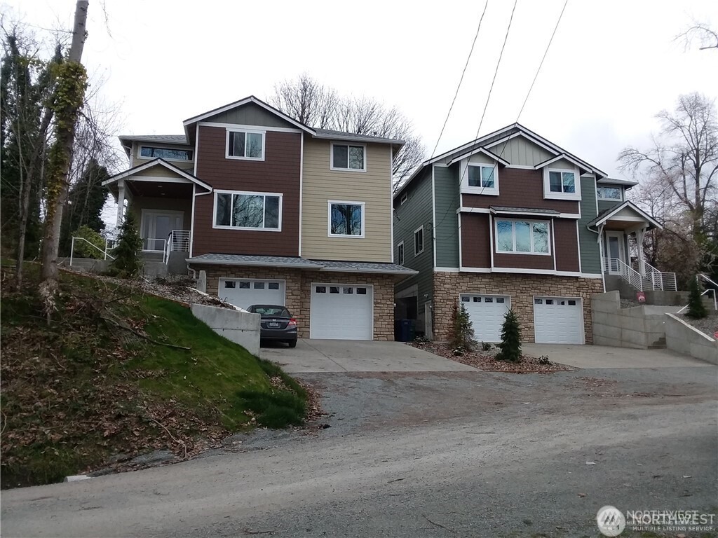 9431 Leroy Place South Seattle, WA 98118 - Photo 5 of 7 a front view of a house with yard