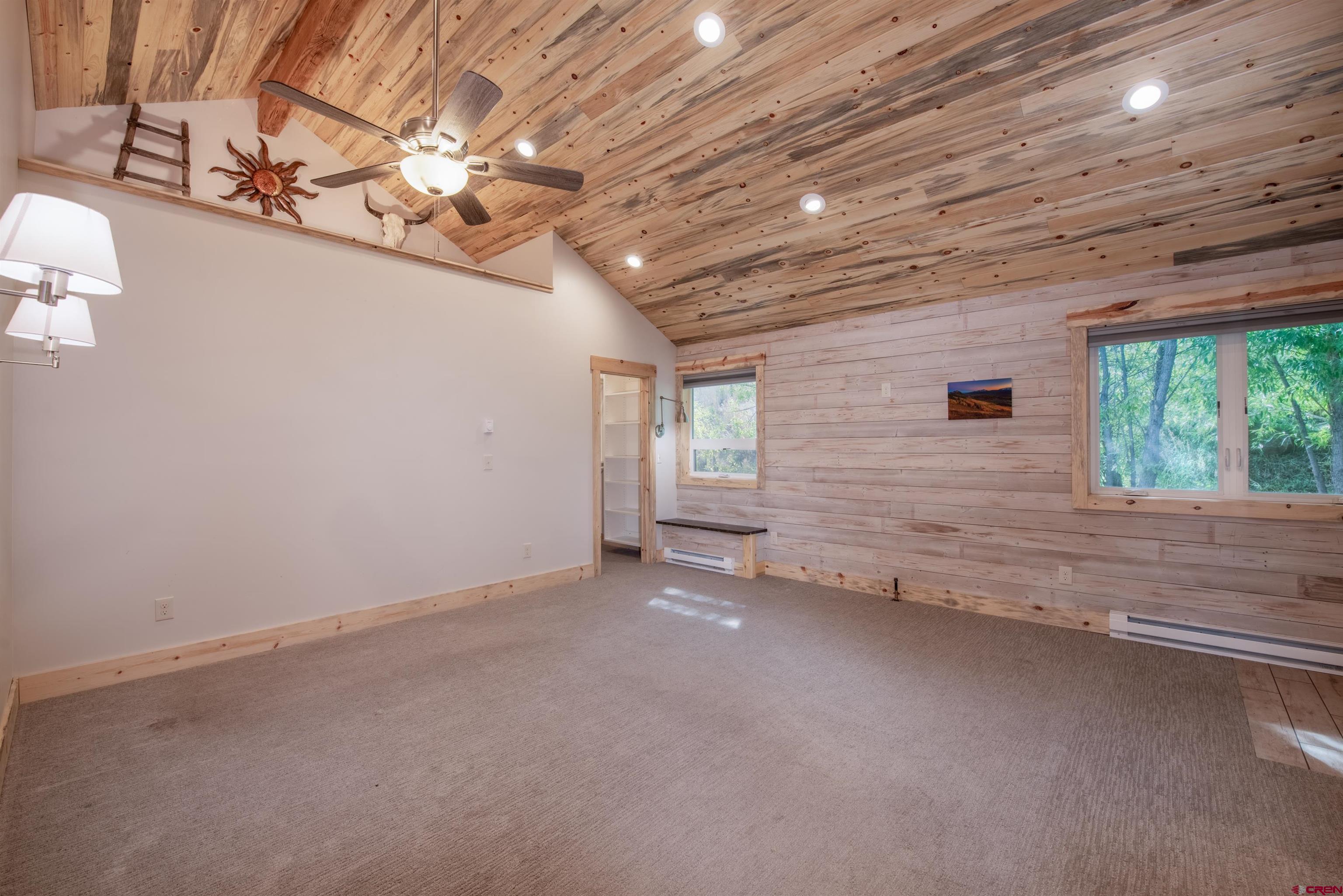15 Debby Way Gunnison, CO 81230 - Photo 16 of 34 en empty room with windows