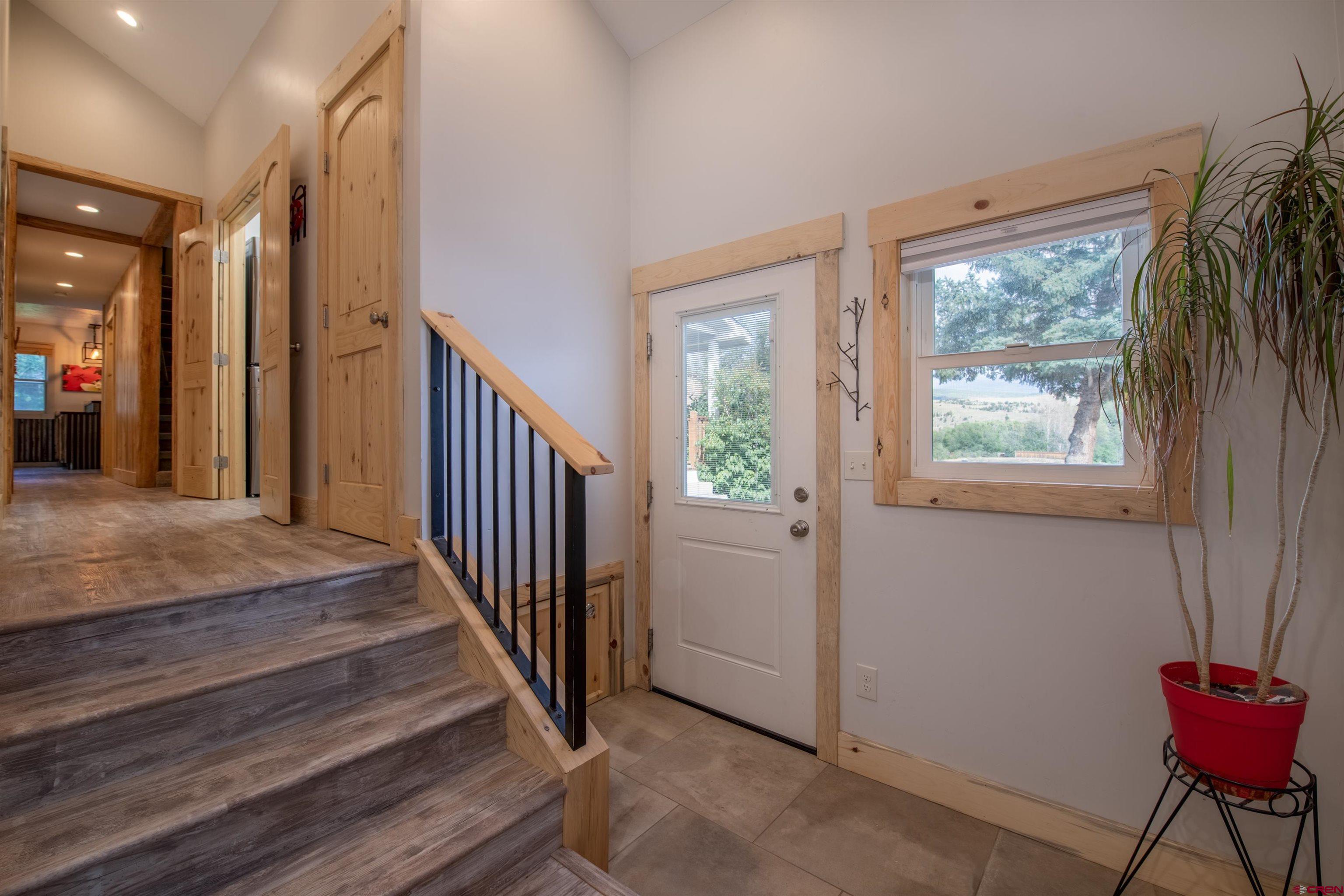 15 Debby Way Gunnison, CO 81230 - Photo 21 of 34 a view of entryway and hall with wooden floor