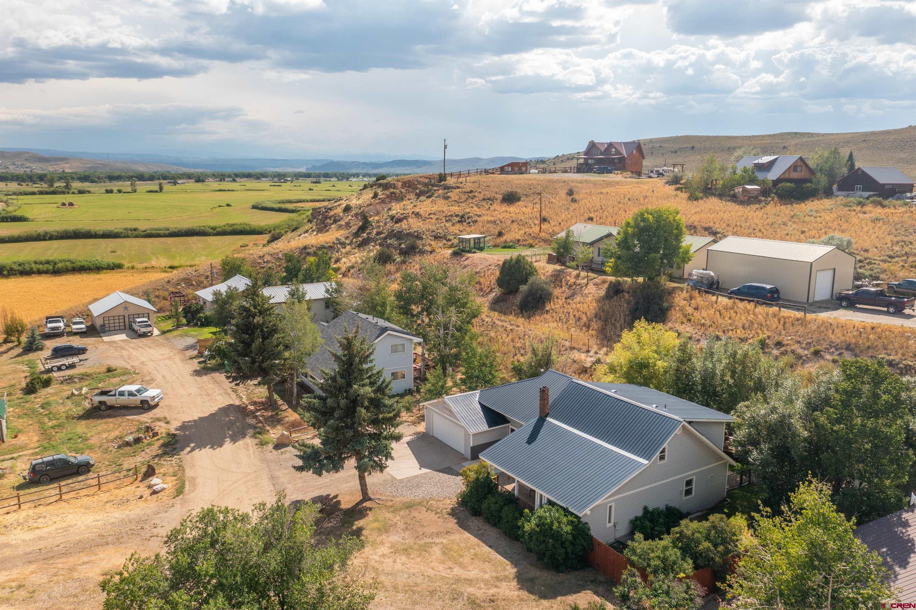 15 Debby Way Gunnison, CO 81230 - Photo 34 of 34 an aerial view of a house with a lake view