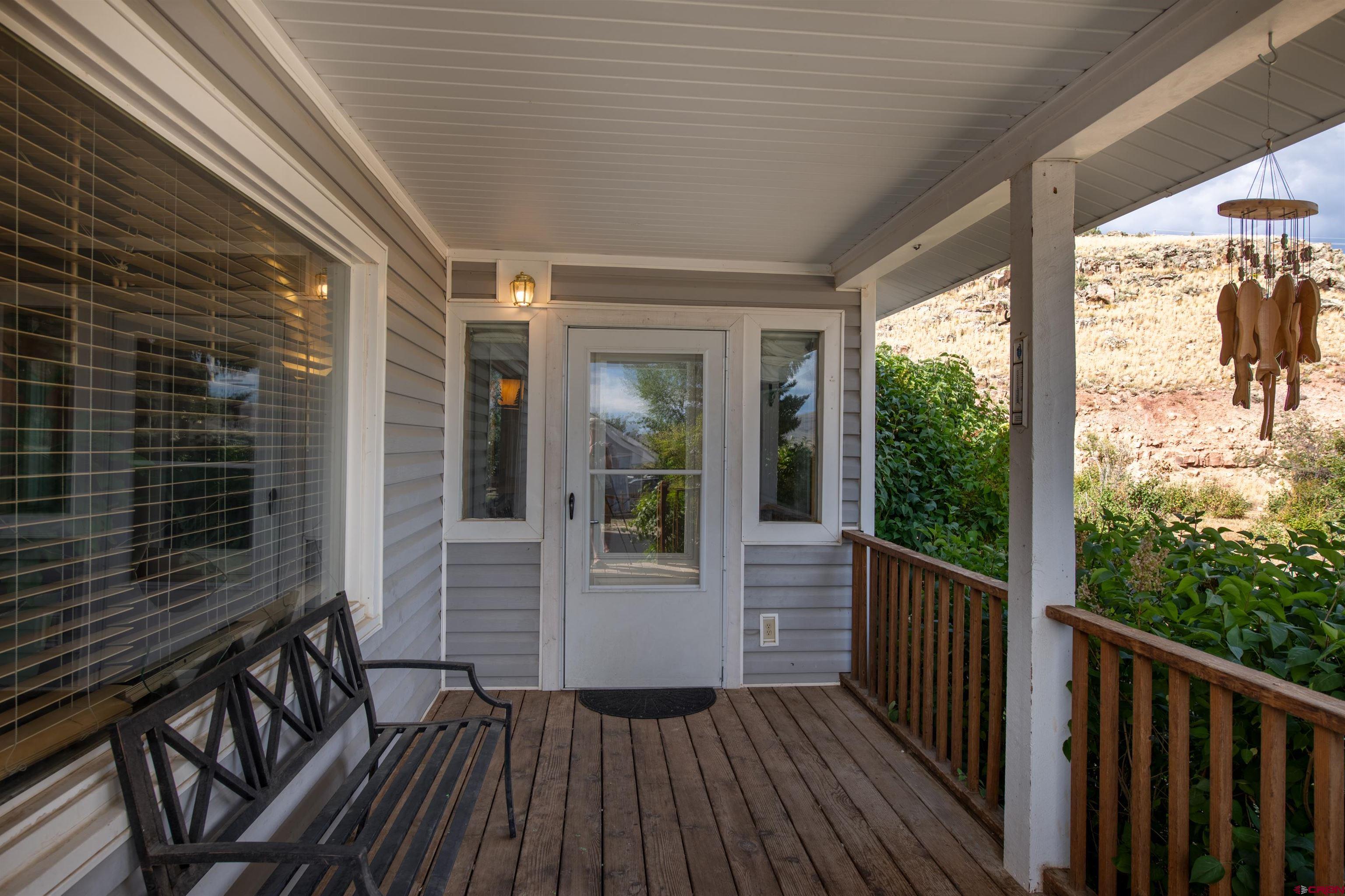 15 Debby Way Gunnison, CO 81230 - Photo 4 of 34 a view of a balcony with wooden floor