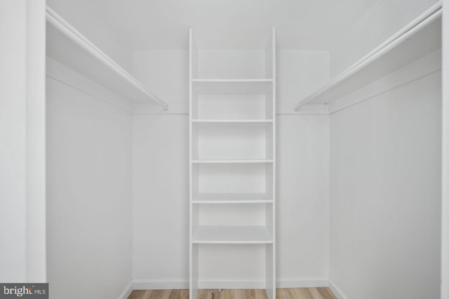 11659 Stoneview Square, Unit 11C Reston, VA 20191 - Photo 21 of 32 Spacious, bright closet with shelving.