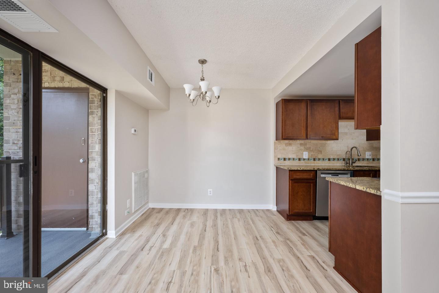 11659 Stoneview Square, Unit 11C Reston, VA 20191 - Photo 9 of 32 Bright and airy open space design.