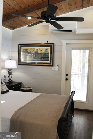 4960 Laurel Lodge Road, Unit 46 Clarkesville, GA 30523 - Photo 28 of 41 a bedroom with a bed and a window