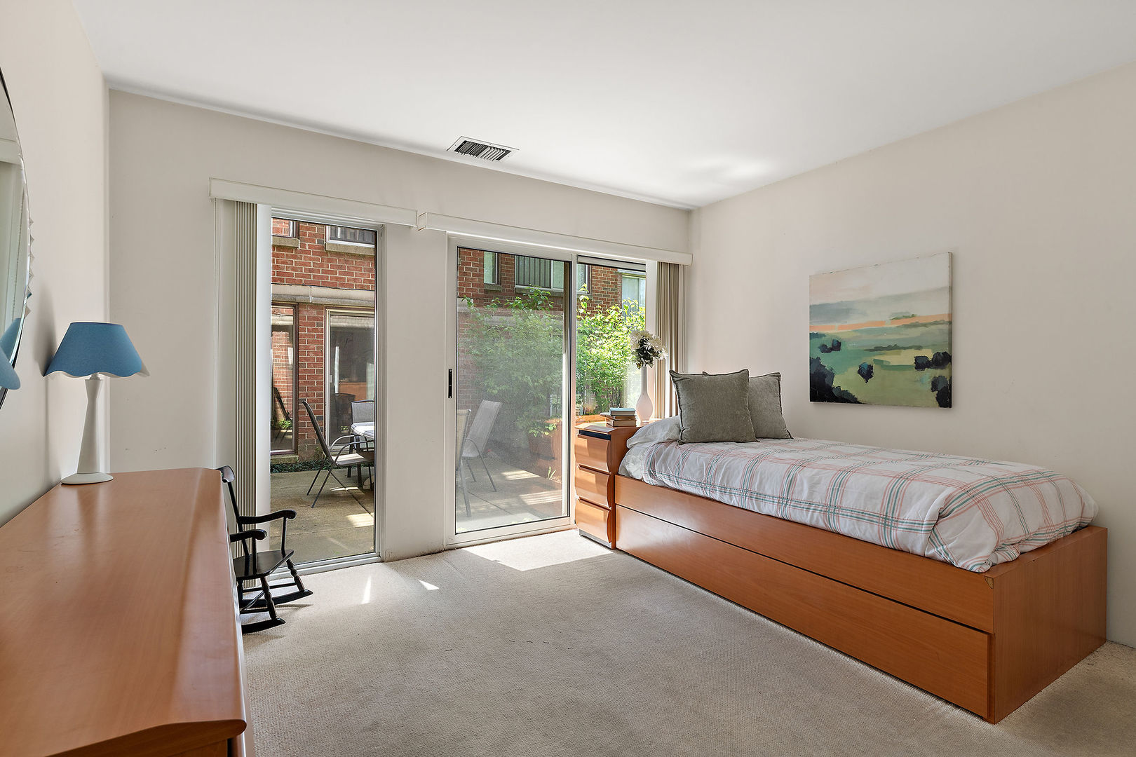 392 Kelburn Road, Unit 122 Deerfield, IL 60015 - Photo 12 of 22 a bedroom with a bed and large window