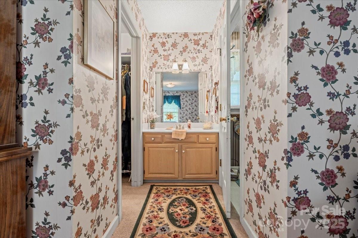332 Ridge Road Cheraw, SC 29520 - Photo 34 of 46 view of a bathroom with shower and mirror