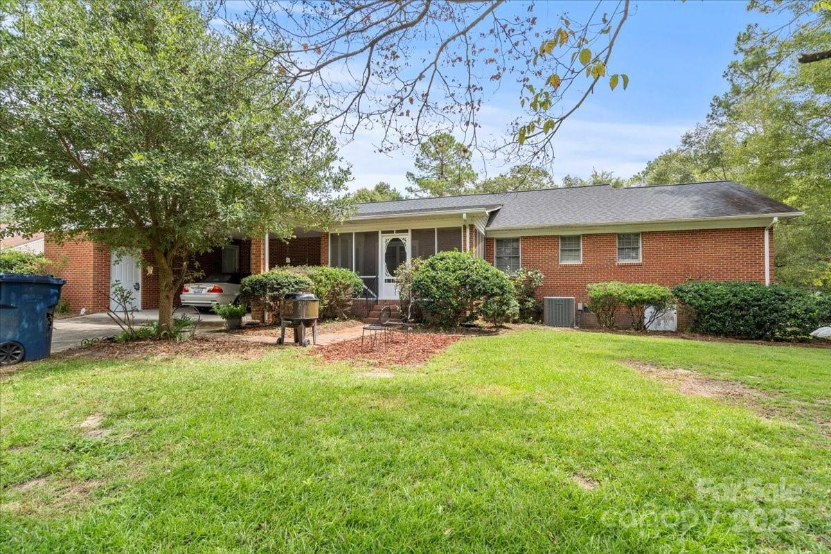 332 Ridge Road Cheraw, SC 29520 - Photo 39 of 46 a house view with a garden space