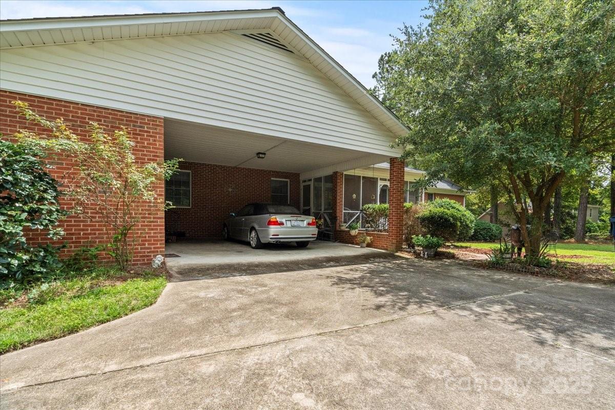 332 Ridge Road Cheraw, SC 29520 - Photo 41 of 46 a view of a car parked in front of a house