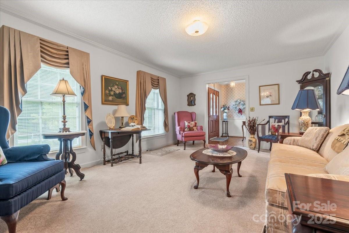 332 Ridge Road Cheraw, SC 29520 - Photo 10 of 46 a living room with furniture and a large window