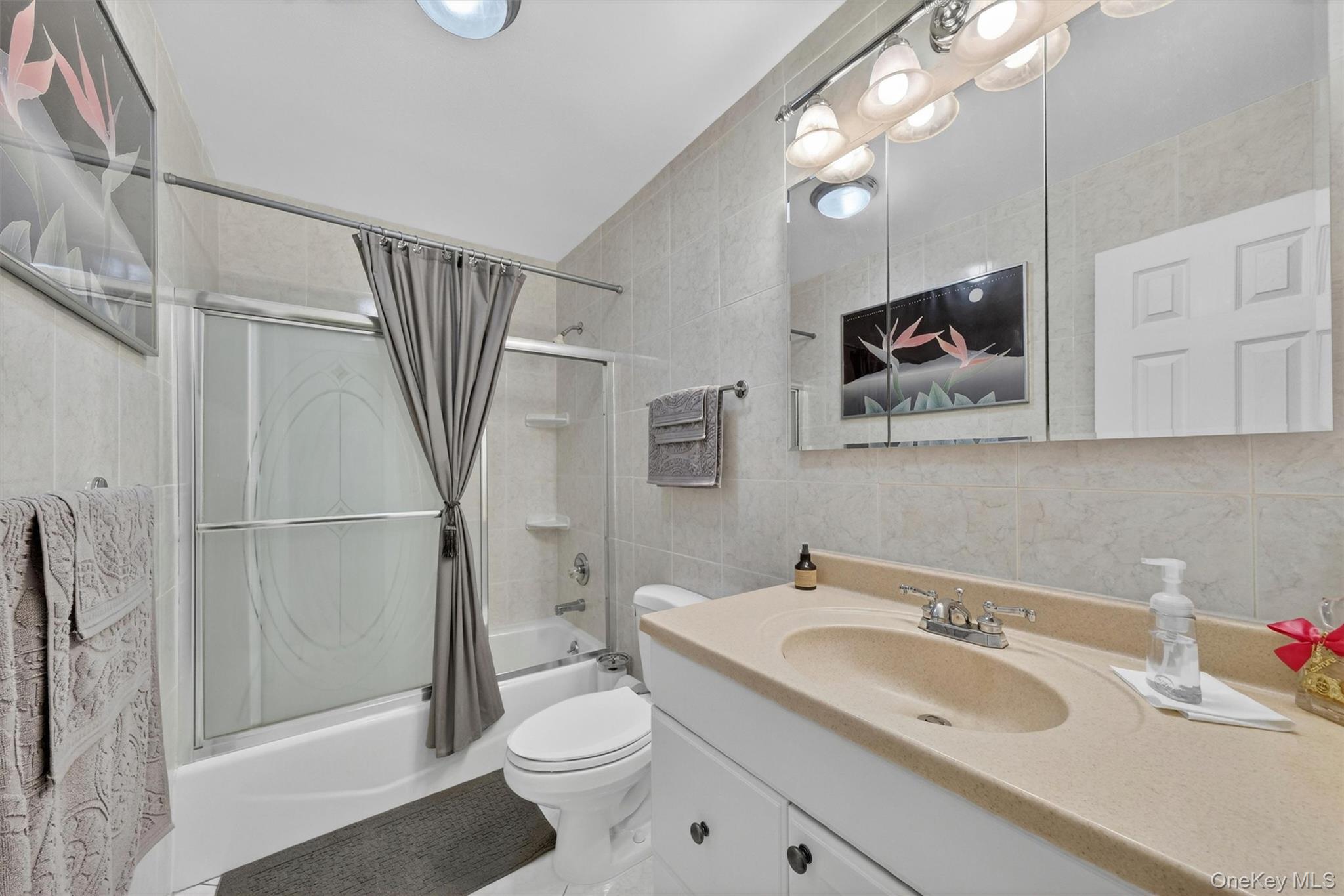 1 Rockledge Road Poughkeepsie, NY 12601 - Photo 23 of 36 Hall bath with updated tile, fixtures and vanity