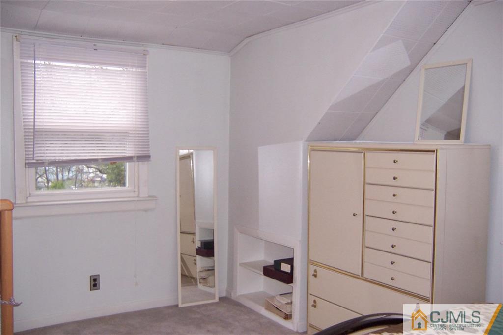175 Midfield Road Colonia, NJ 07067 - Photo 16 of 25 a view of an empty walk in closet
