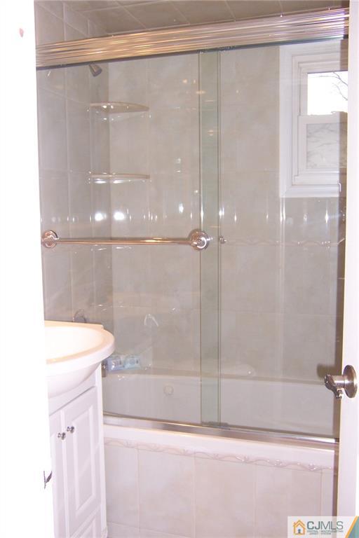 175 Midfield Road Colonia, NJ 07067 - Photo 20 of 25 a bathroom with a shower