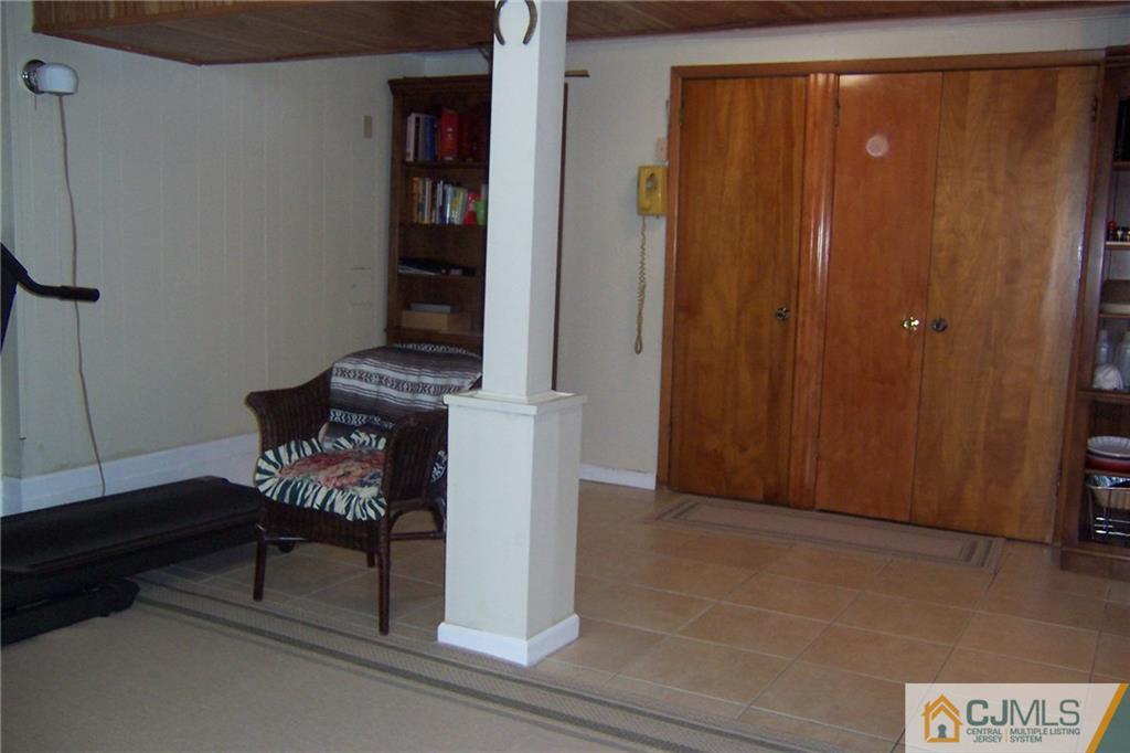 175 Midfield Road Colonia, NJ 07067 - Photo 22 of 25 a view of an entryway with wooden door