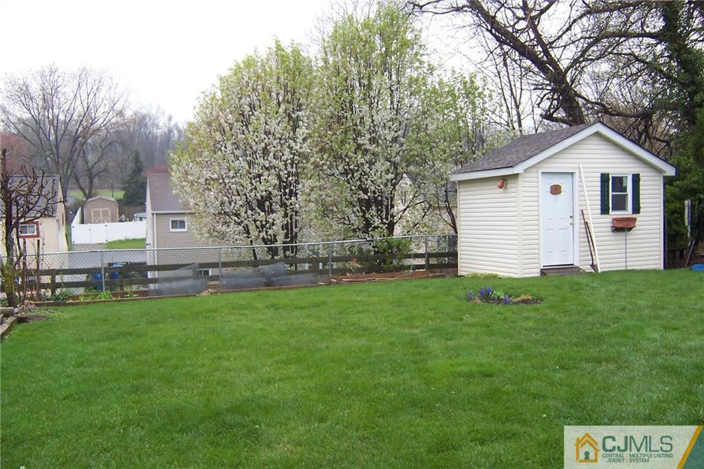 175 Midfield Road Colonia, NJ 07067 - Photo 25 of 25 a view of a backyard with a garden