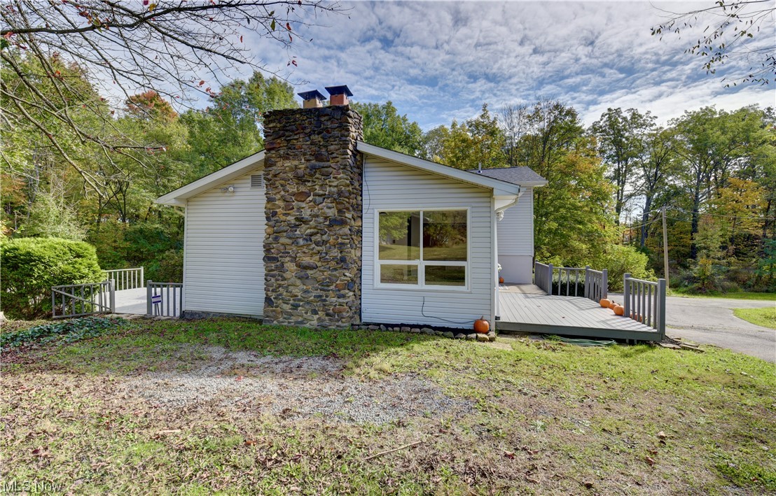 9681 Williams Road Diamond, OH 44412 - Photo 25 of 27 View of property exterior featuring a deck