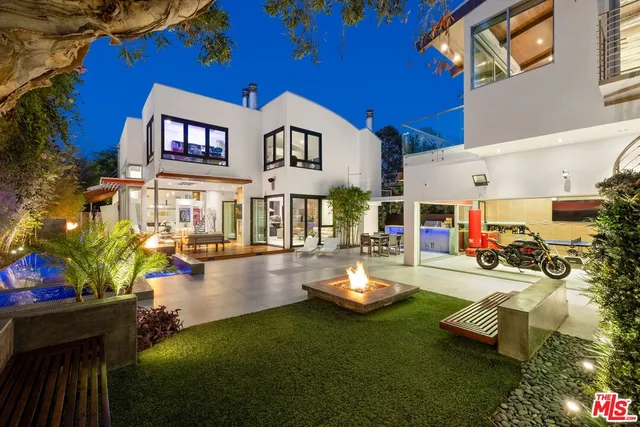 a view of swimming pool with outdoor seating