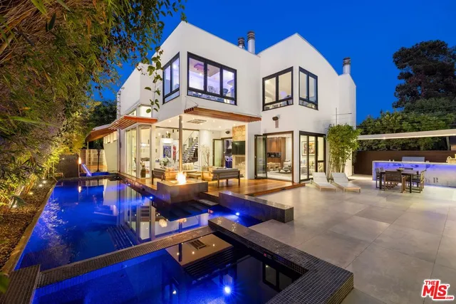 a view of a brick building with many windows