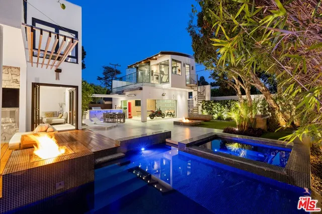 a view of swimming pool from a balcony