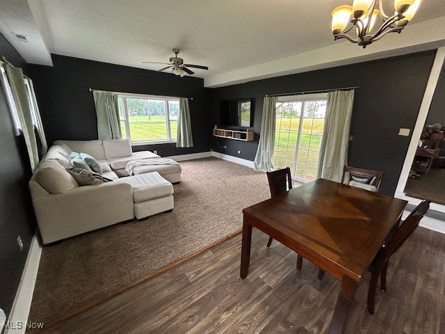 48 North Firestone Road Wooster, OH 44691 - Photo 6 of 22 Living room with hardwood / wood-style floors, ceiling fan with notable chandelier, and a healthy amount of sunlight