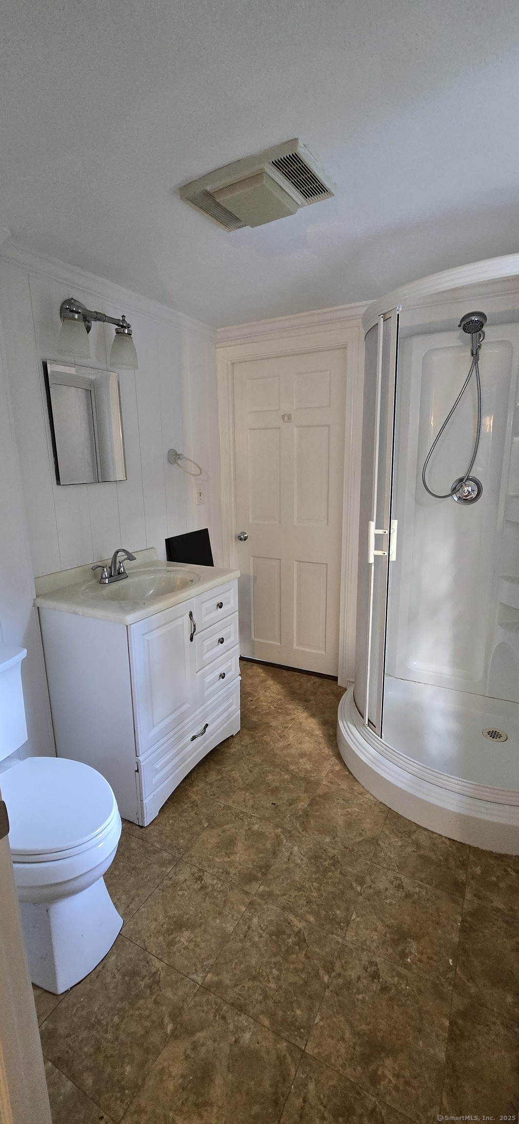 187 West Avon Road Avon, CT 06001 - Photo 16 of 40 a bathroom with a granite countertop sink a toilet and a shower