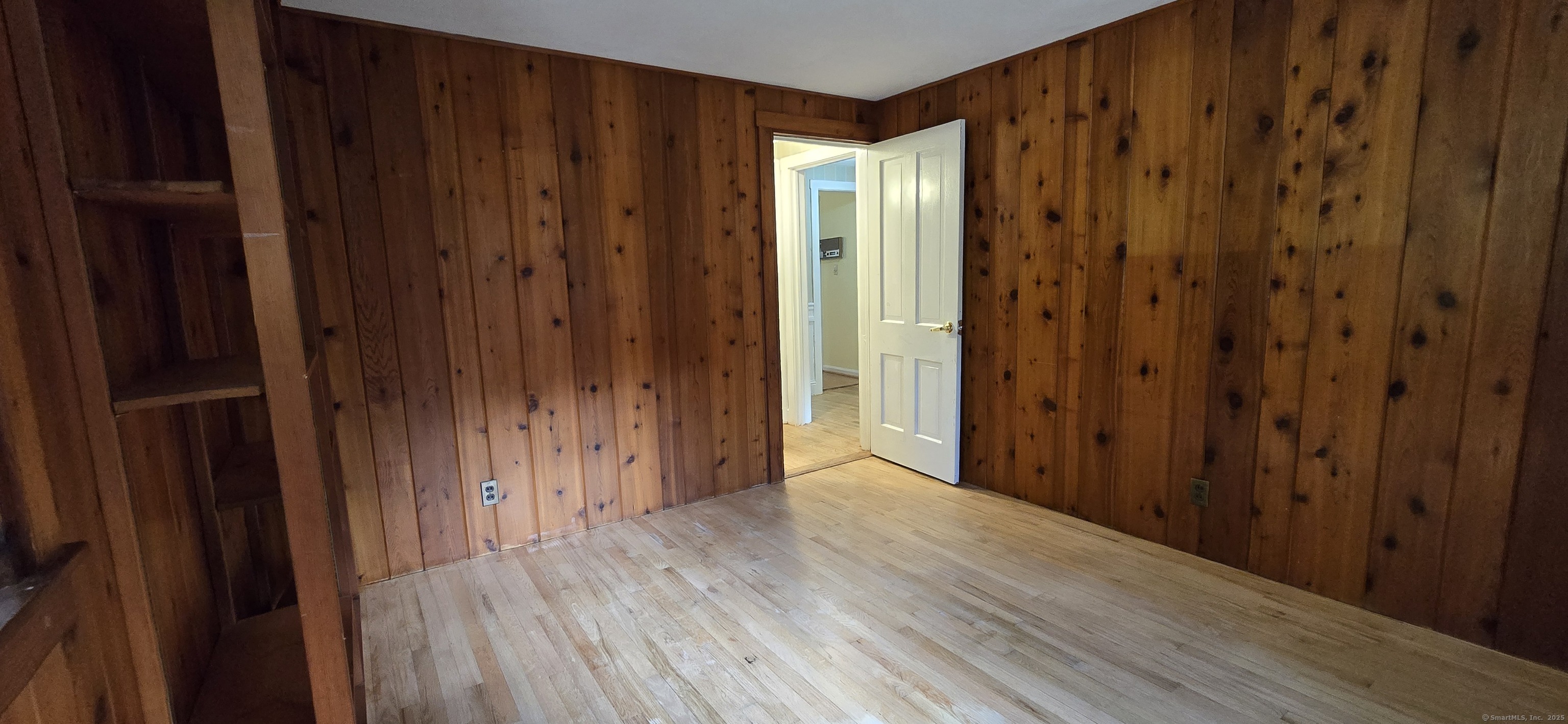 187 West Avon Road Avon, CT 06001 - Photo 18 of 40 a view of a hallway with wooden floor