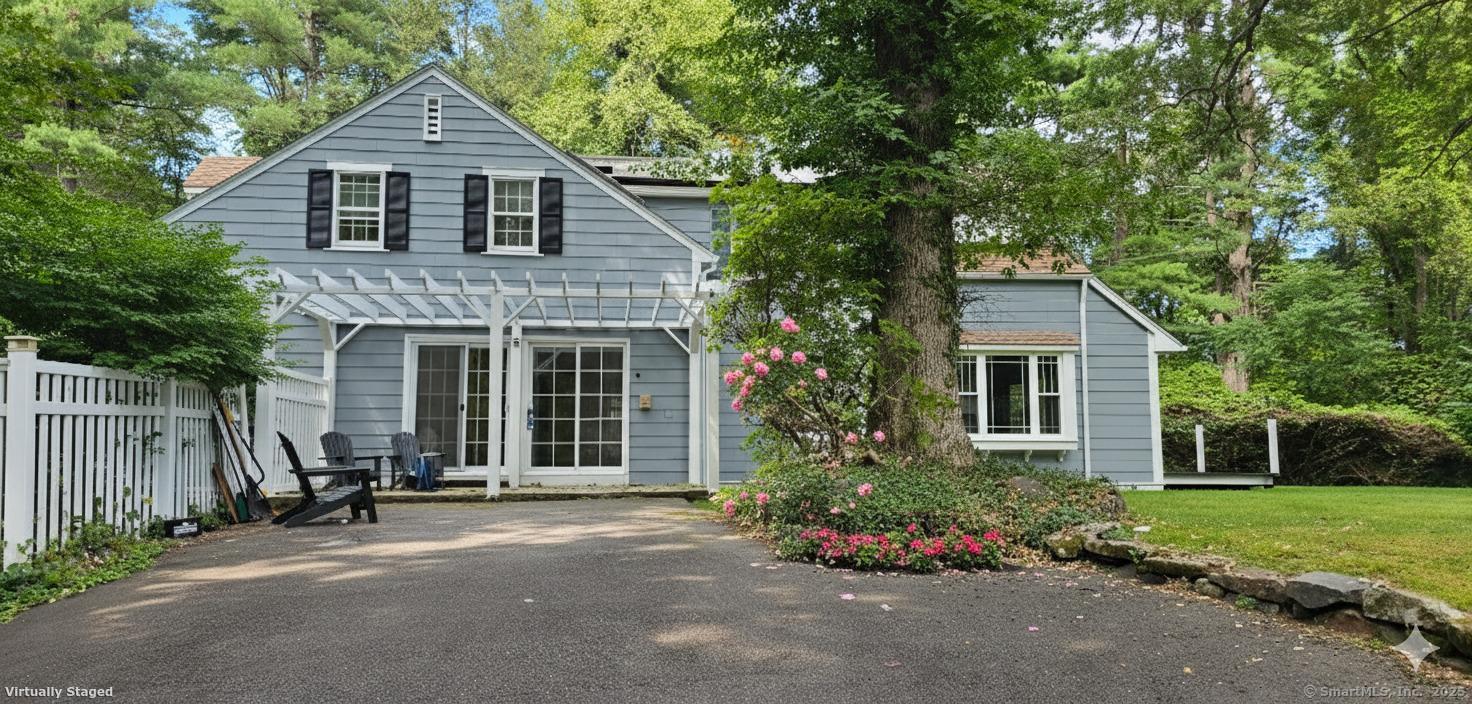 187 West Avon Road Avon, CT 06001 - Photo 21 of 40 a front view of a house with a yard