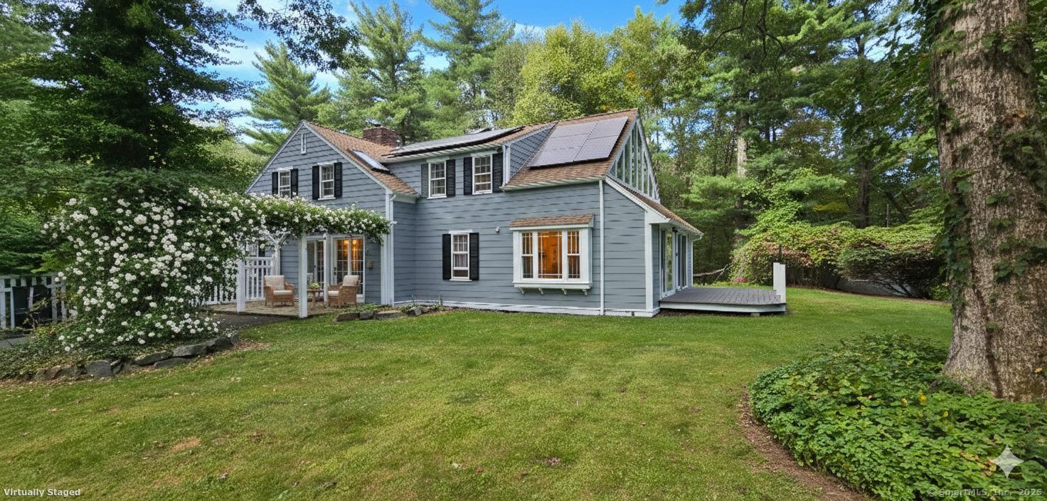 187 West Avon Road Avon, CT 06001 - Photo 23 of 40 a front view of a house with a garden