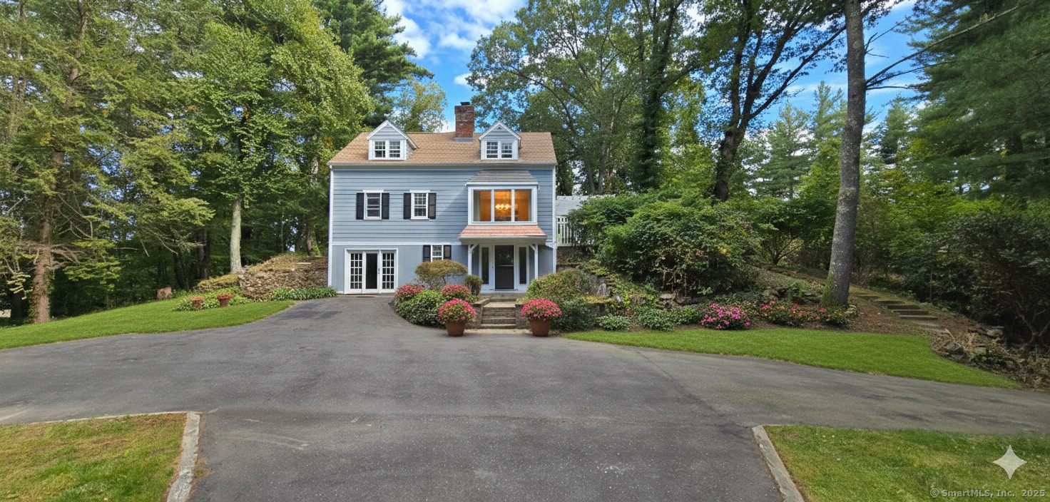 187 West Avon Road Avon, CT 06001 - Photo 33 of 40 a view of a house with a yard and large trees