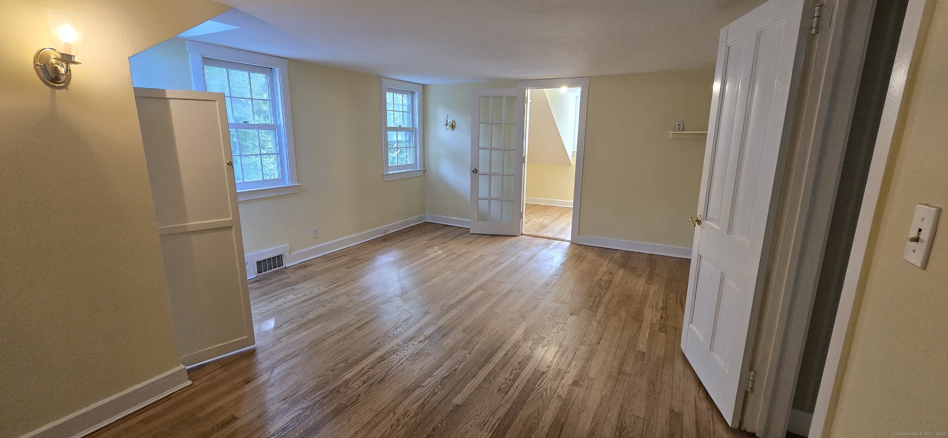 187 West Avon Road Avon, CT 06001 - Photo 9 of 40 a view of wooden floor in an empty room