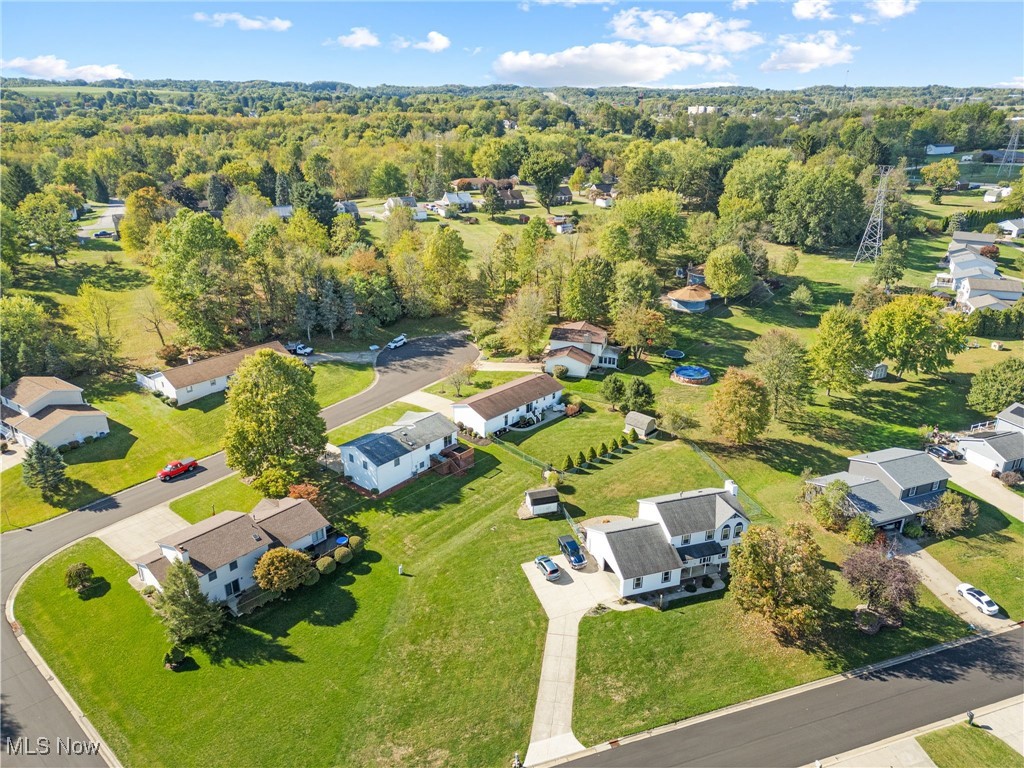 1521 Bravado Road Southwest Canton, OH 44706 - Photo 32 of 37 Aerial view of property and surrounding area with nearby suburban area