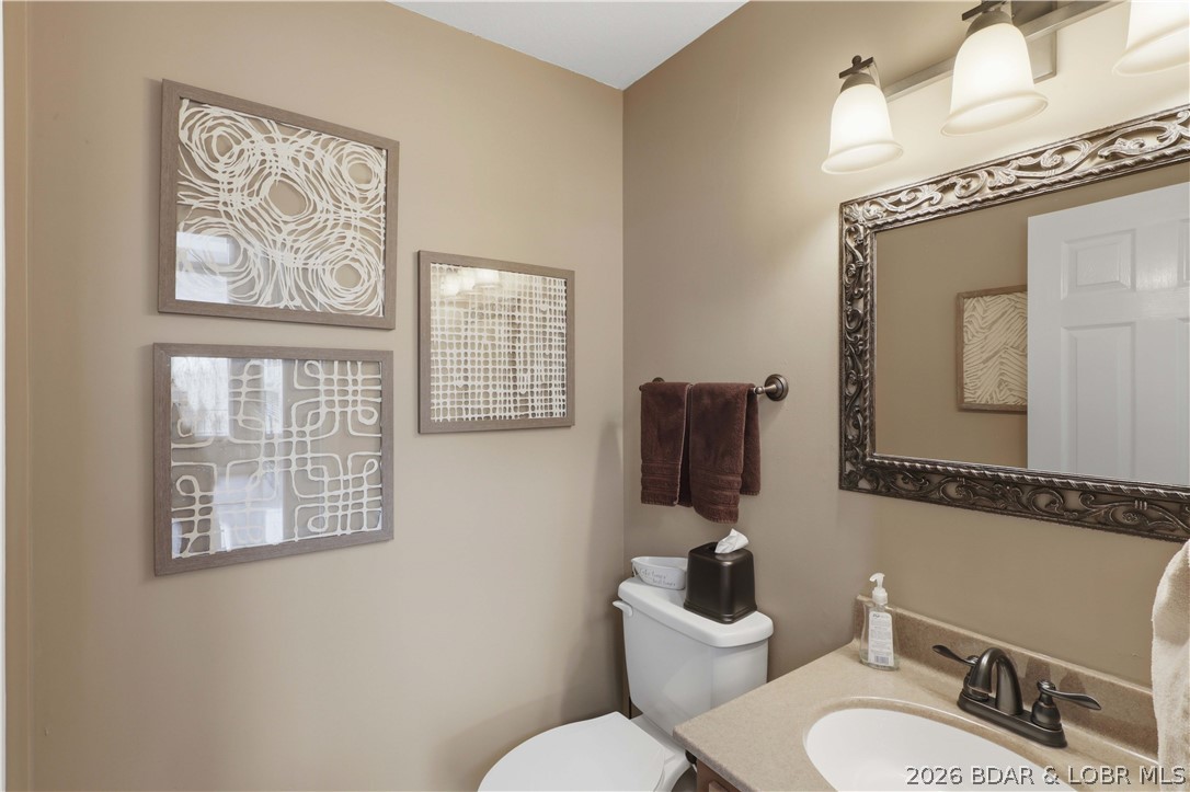231 Ridgewood Drive Lake Ozark, MO 65049 - Photo 23 of 56 Half bath off of the living room