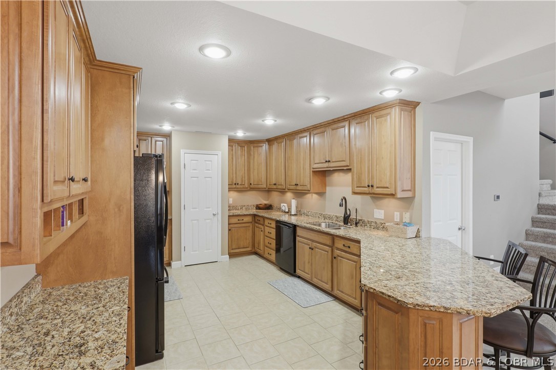 231 Ridgewood Drive Lake Ozark, MO 65049 - Photo 5 of 56 Functional kitchen with plenty of cabinets