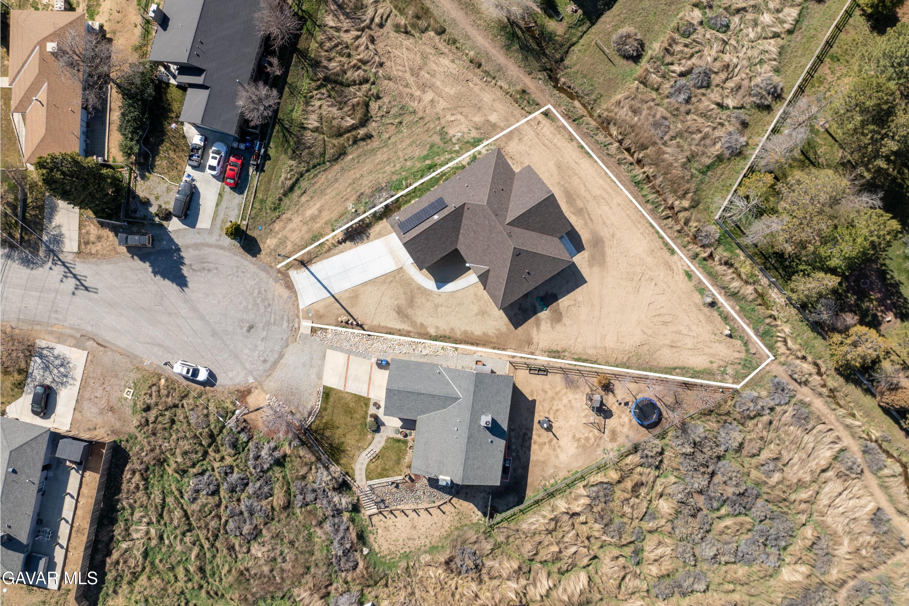 22613 Royal Place Tehachapi, CA 93561 - Photo 23 of 28 a view of a house with a tree