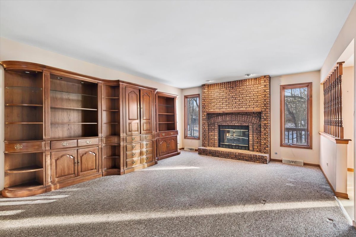 320 South Garfield Avenue New Lenox, IL 60451 - Photo 5 of 20 a view of a livingroom with furniture and fireplace