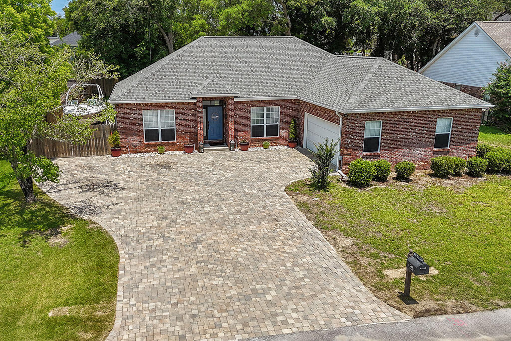 4475 New Market Road Niceville, FL 32578 - Photo 29 of 31 a aerial view of a house with a yard
