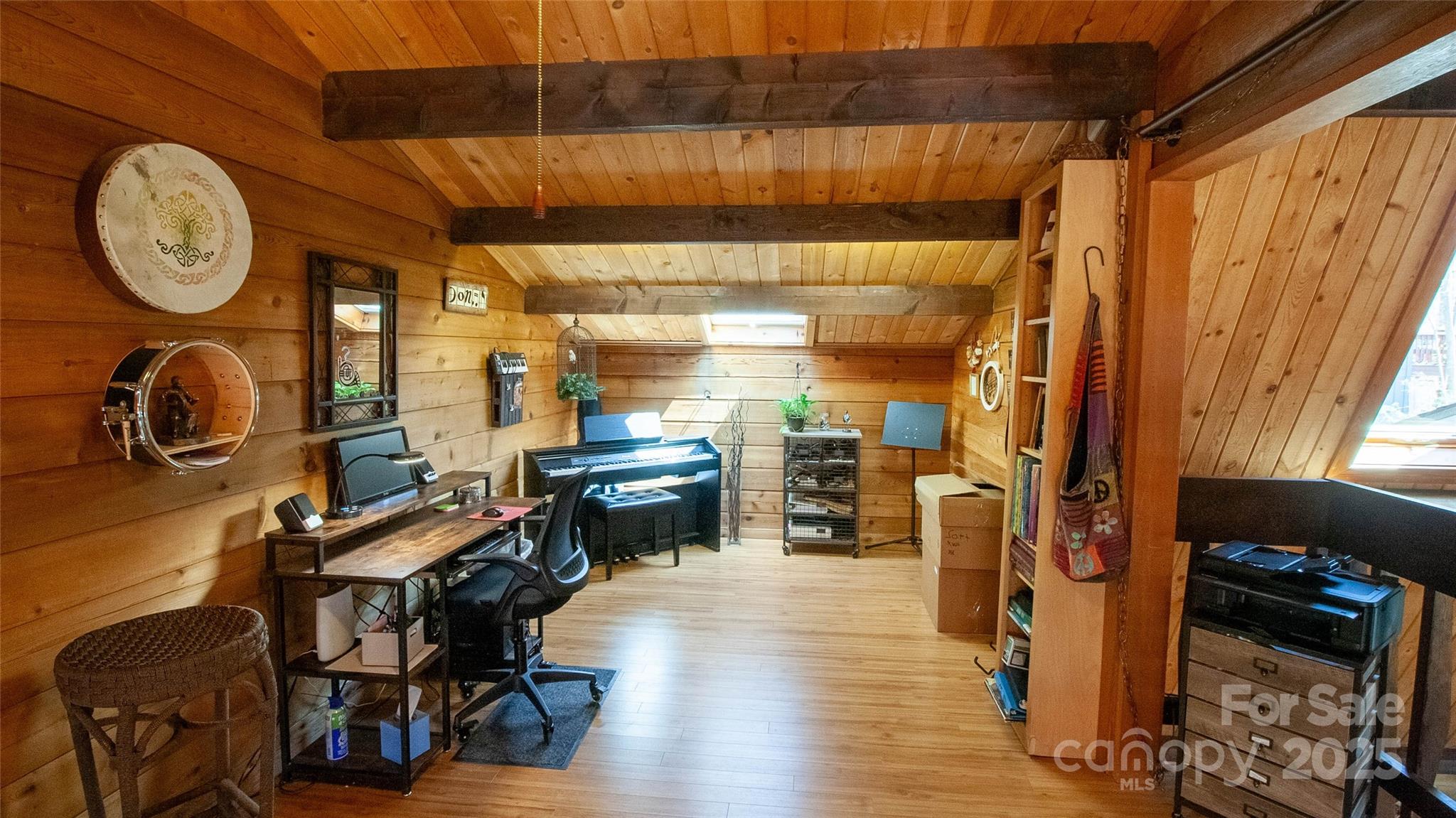 280 Kilgore Road Waynesville, NC 28785 - Photo 23 of 45 a view of a dining room with furniture window and wooden floor