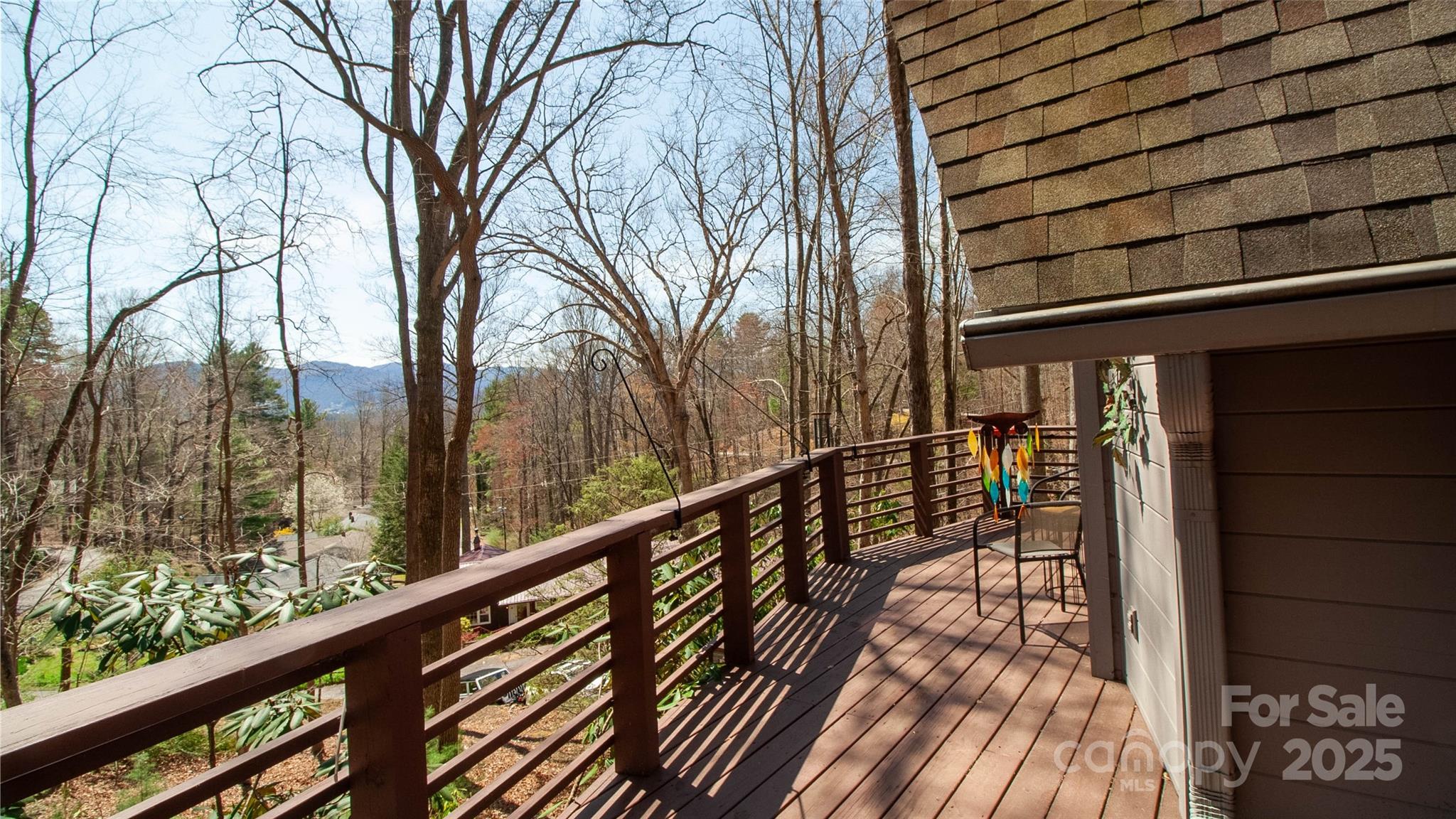 280 Kilgore Road Waynesville, NC 28785 - Photo 3 of 45 a view of balcony with wooden floor and fence and floor