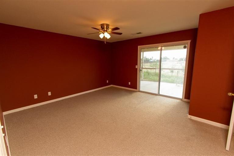 16150 Monreal Road Madera, CA 93636 - Photo 8 of 15 Master Bedroom suite showing slider to back covered patio.