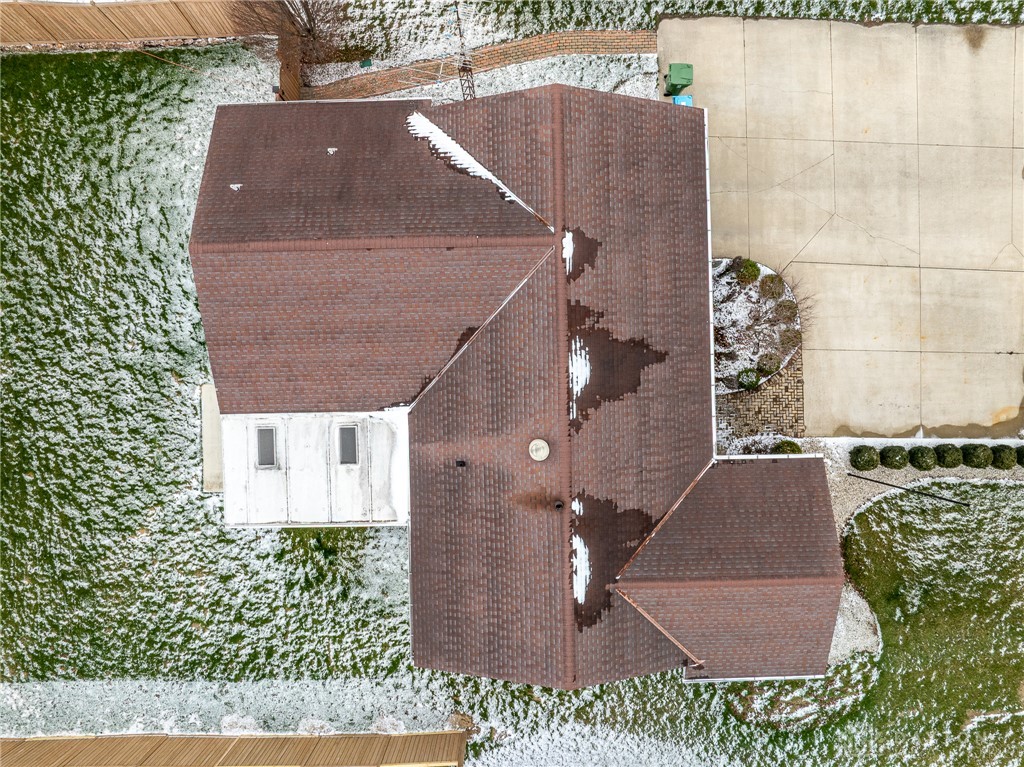305 South Vandemark Road Sidney, OH 45365 - Photo 3 of 32 An aerial view showcases the property with a durable shingle roof and surrounding landscape.