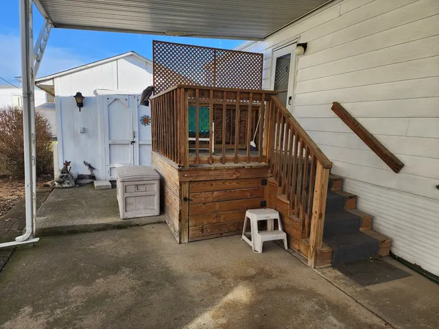 a view of a porch with a bench