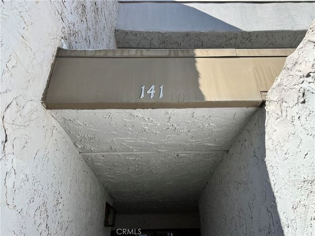 a white bath tub sitting in a bathroom