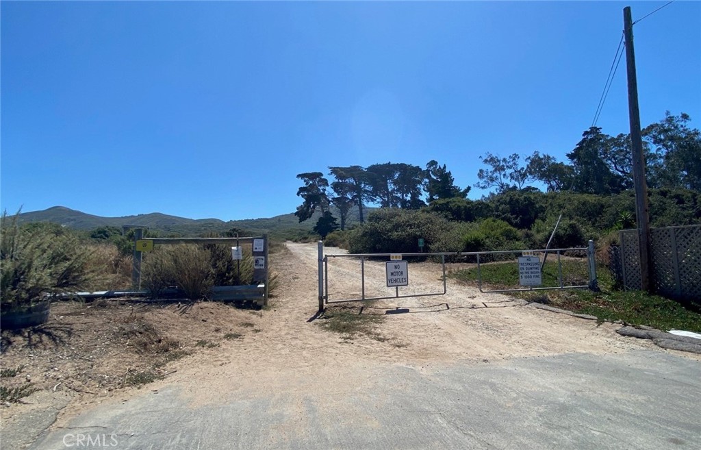 509 Lilac Drive Los Osos, CA 93402 - Photo 3 of 4 a view of a lake with a mountain in the background