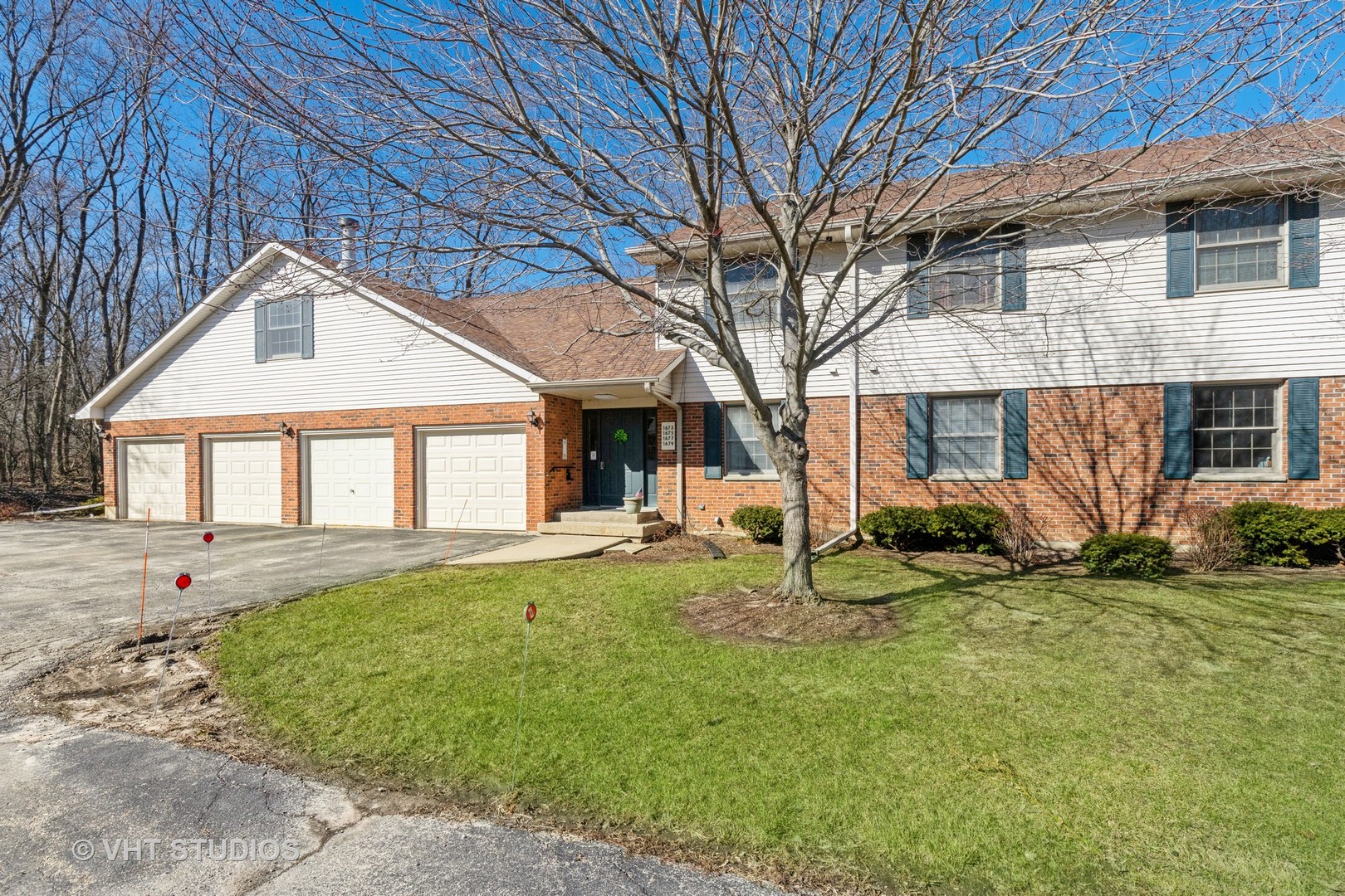 1675 West Beach Road, Unit 1675 Waukegan, IL 60087 - Photo 2 of 12 a view of a house with backyard and sitting area