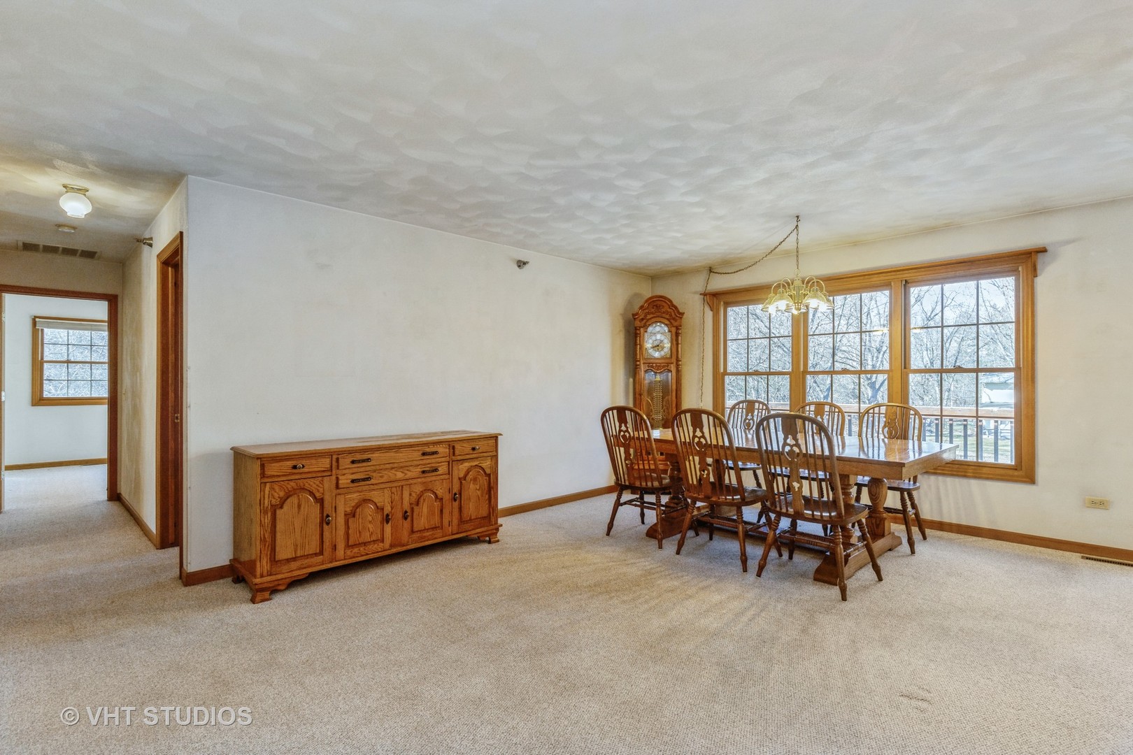 1675 West Beach Road, Unit 1675 Waukegan, IL 60087 - Photo 7 of 12 a view of a dining room with furniture window and outside view