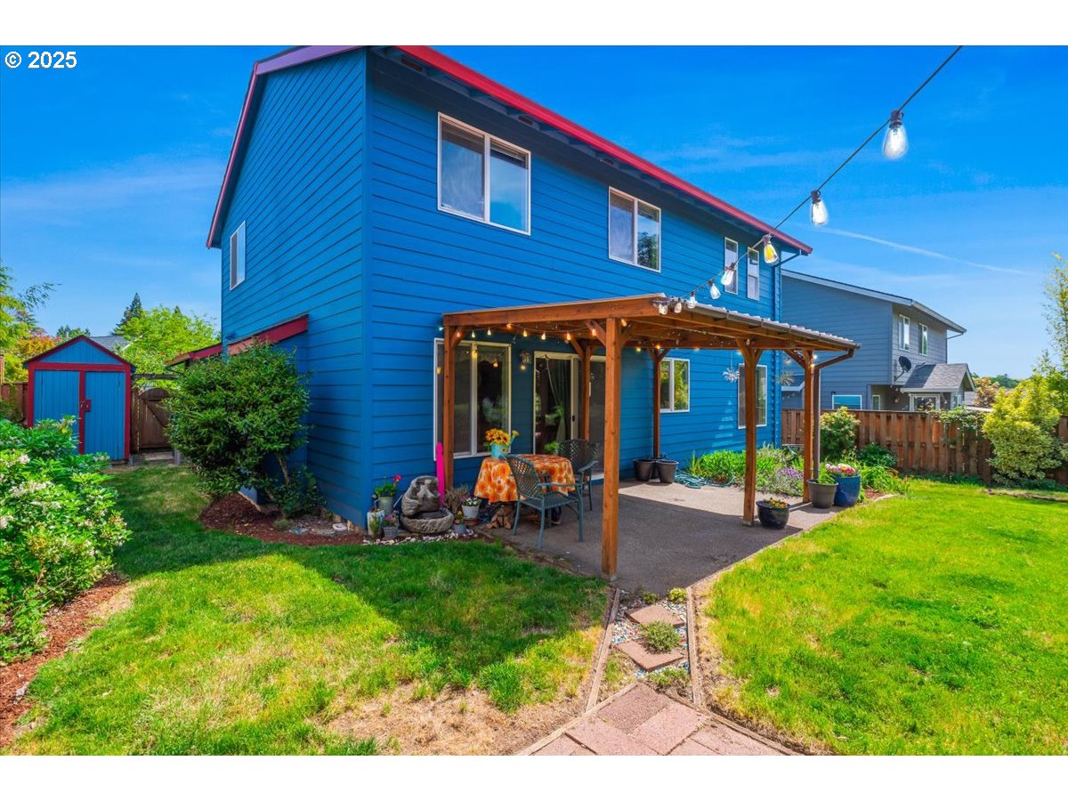 287 Southwest Oliver Court Dundee, OR 97115 - Photo 38 of 41 a view of a house with a yard porch and sitting area