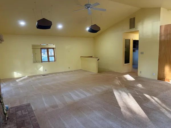 a view of a hallway with room