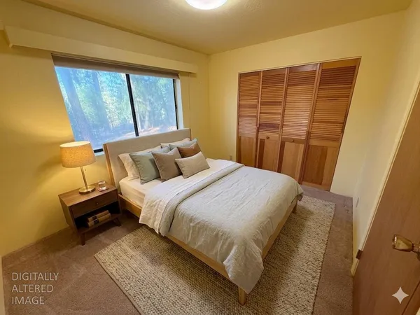 a view of a livingroom with a furniture