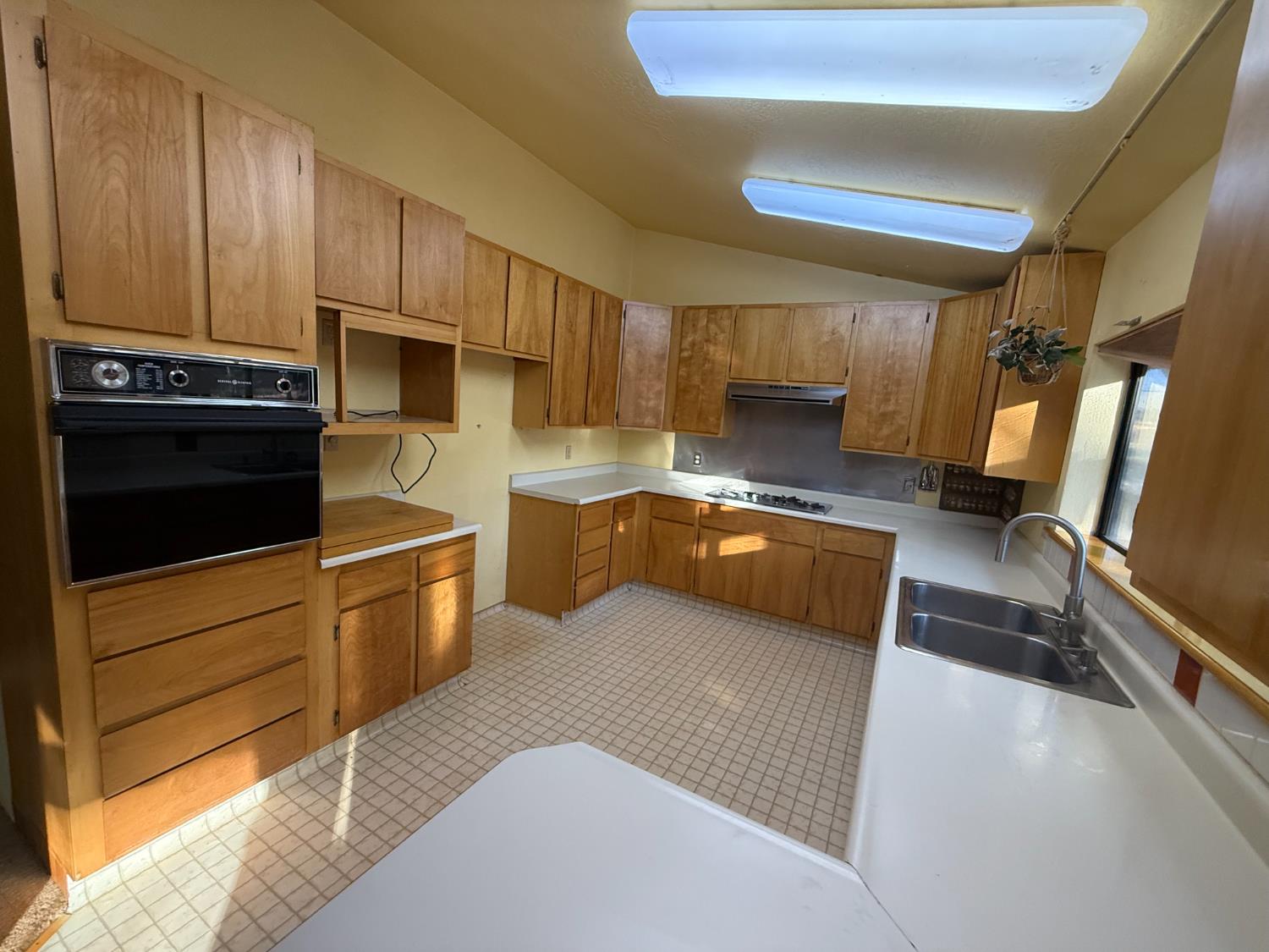 75 Sandy Gulch Lane West Point, CA 95255 - Photo 5 of 39 a kitchen with stainless steel appliances granite countertop a stove a sink and a refrigerator