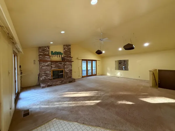 a view of a livingroom with a fireplace